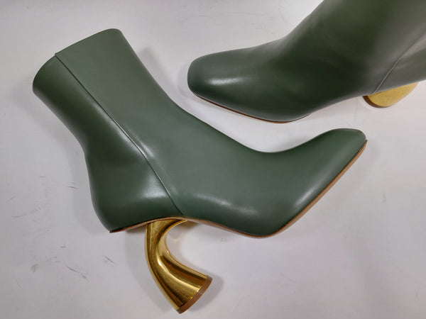 Olive green booties on bronze heel
