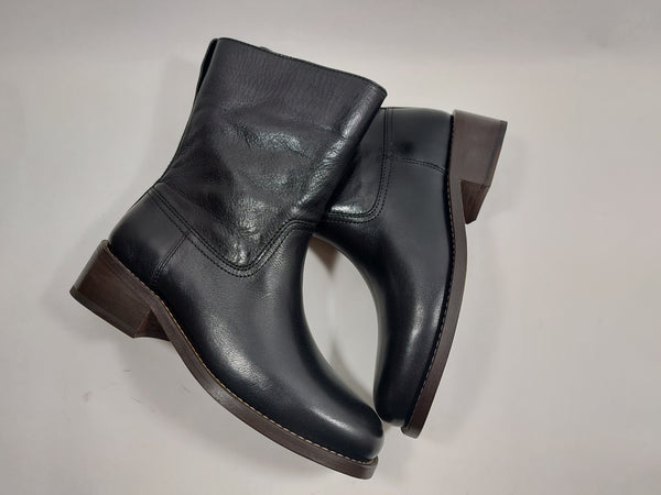 Black boots on low heel