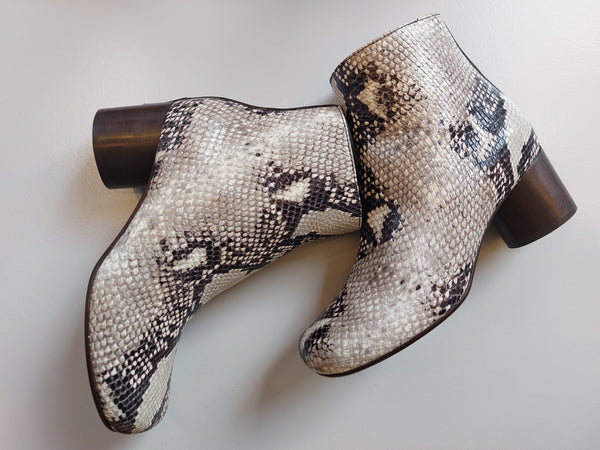 Booties with snake print on low heel