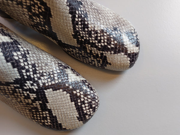 Booties with snake print on low heel