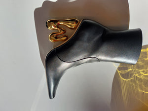 Black booties w gold JW heels