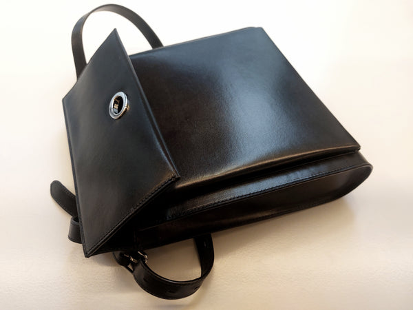 Black handbag, the Seed Satchel