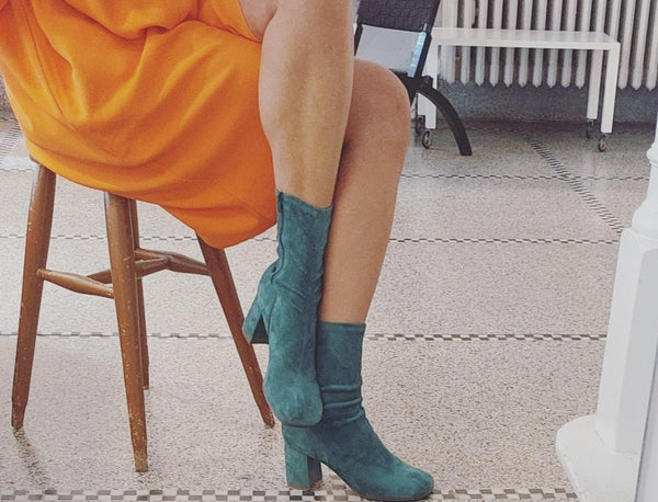 Stretchy ankle boots in petrol green