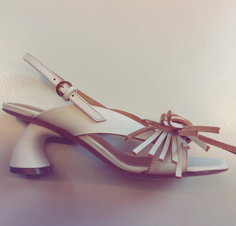 White sandals with fringe