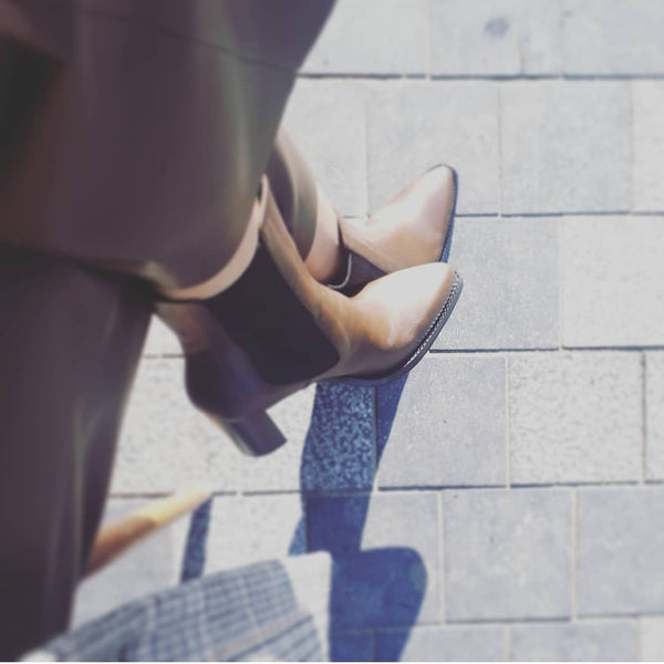 High heeled boots in dark brown