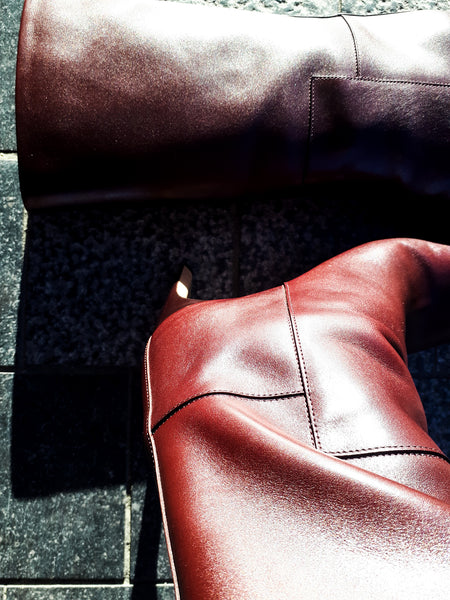 Burgundy high heeled boots