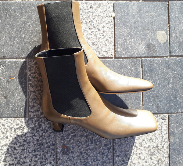 Ankle boots in olive leather