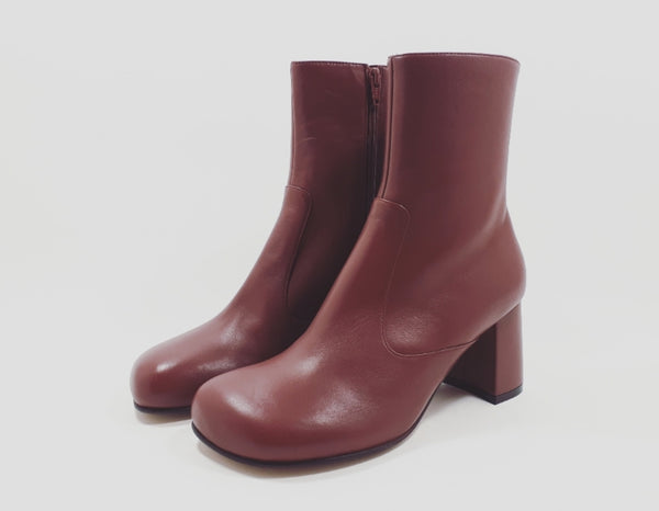 Ankle boots in rusty red