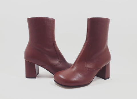 Ankle boots in rusty red
