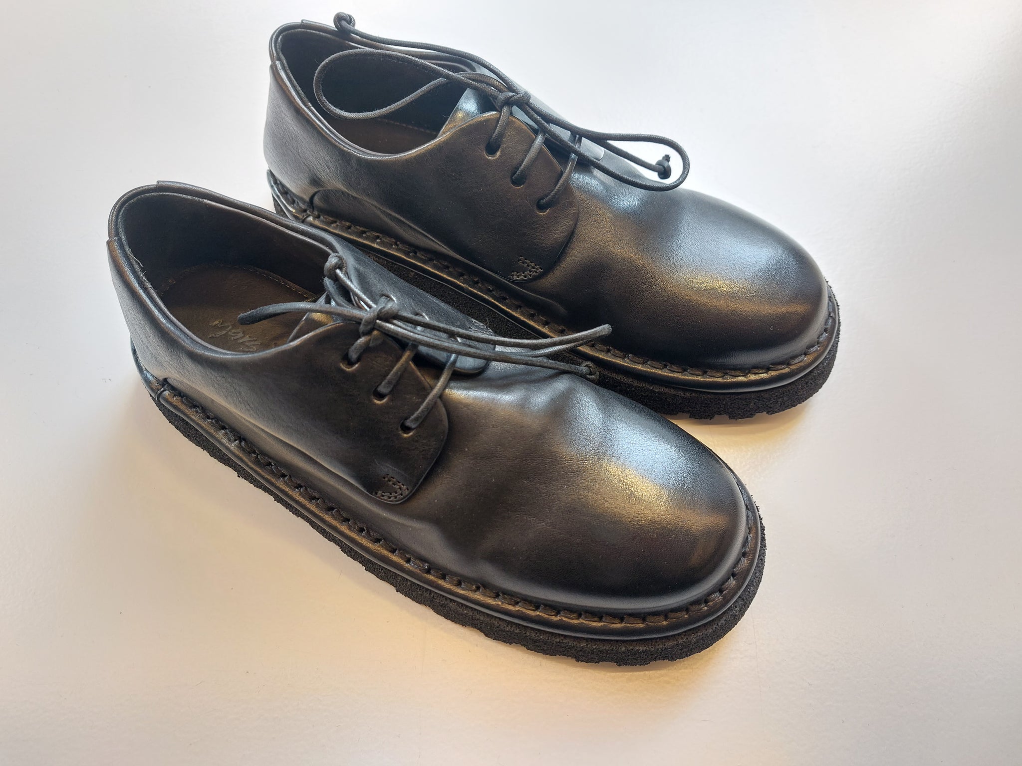 Black lace- up gomma style w lighter sole.