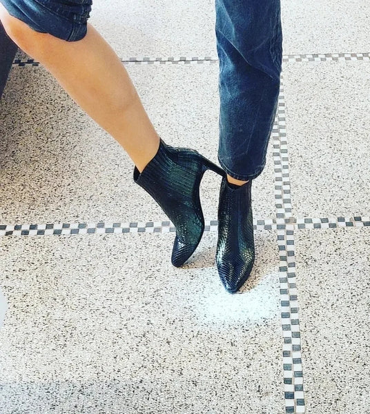 Ankle boots in green python