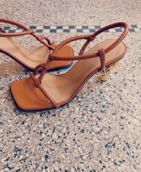 Sandal with gold heel