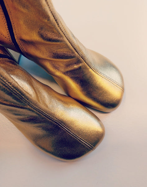 Golden stretch leather boots